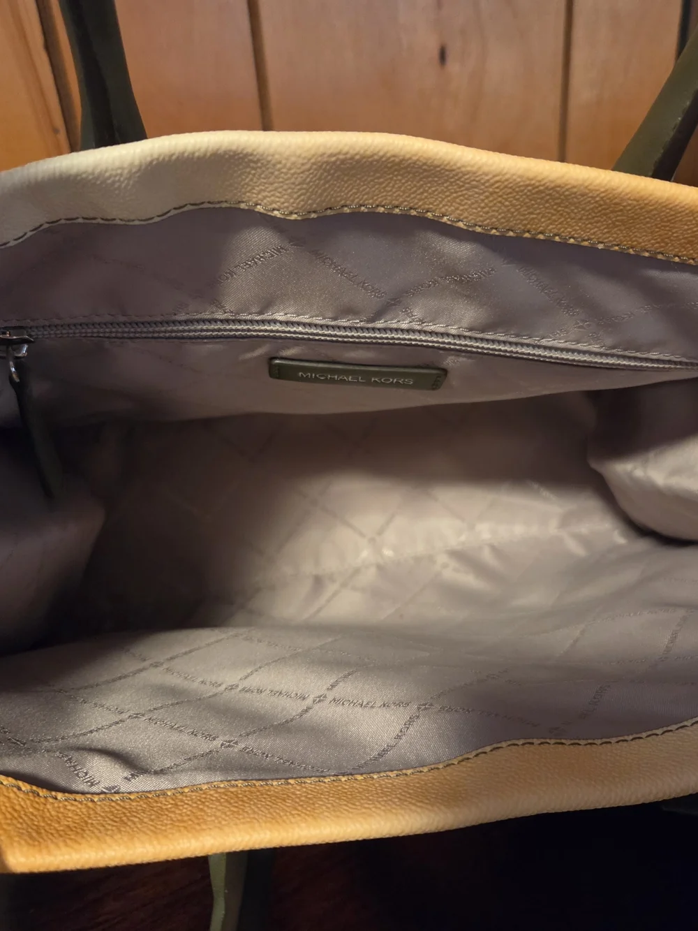Michael Kors, Kate Spade And Dooney And Burke